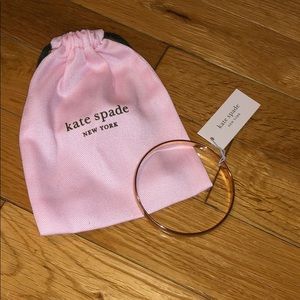 KATE SPADE bracelet $ pink bag.